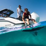 NAVAN S30 2025 luxury sports cruiser with twin Mercury 300 V8 engines, black hardtop, white hull, gold stripe, and premium SMART Edition features